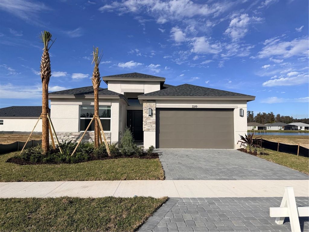 Photo of 3319 Malta Avenue, Wesley Chapel, FL 33543 (MLS # J998113)