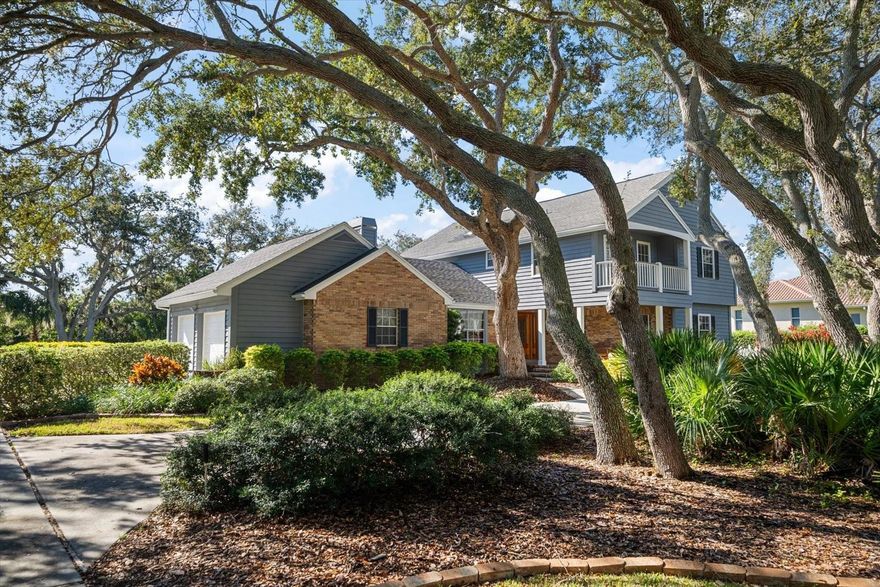 A rare opportunity becomes available to own this timeless property offering a one owner custom residence on a premier .70-acre lot with outdoor areas that mirror a private sanctuary. An inviting front porch beckons you through the leaded glass door entry where one can appreciate a home designed with the modern family in mind. The floorplan separates social life from rest with its desirable “all-up” bedroom configuration. Vaulted beamed ceilings, impressive natural wood moldings, built-ins with integrated storge, inviting floating staircase and French doors that capture the private backyard paradise reconfirm that this property is exceptional! The resort-style pool surrounded by attractive brick pavers adjoins expansive green space, fenced for worry free usage by children and pets. This residence features an observation deck overlooking a small saltwater canal with direct access to the intracoastal. Most notably, the home and grounds maintain no history of rising waters or storm damage. Designed for a serious chef or entertainer, the kitchen is clearly the heart of the home. A contemporary center island is the focal point for family gatherings or culinary experiences and abundant cabinetry, smooth stone counters, custom brick surround wall complement this area so rich in natural light.  Formal dining and living areas, breakfast nook, and a spacious family room overlooking the lush private backyard and pool complete the ground level living area. Upstairs bedroom quarters of 4 include a large primary suite with lovely bath and walk in shower, a Juliette balcony off of a bedroom and skylights that capture natural light all year. Located in the quiet neighborhood of Indian Springs just minutes to exquisite beaches and major access roads to Tampa, St Pete and Clearwater, this is a gem of a property where space meets lifestyle and families grow and create memories to last a lifetime!