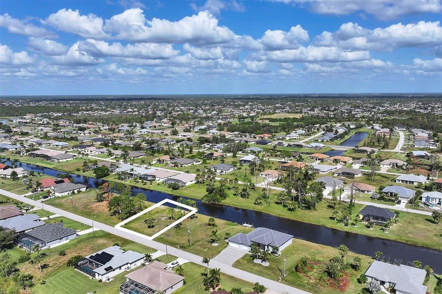 Build the home of your dreams on this terrific waterfront home site, with plenty of builders to choose from and a quiet neighborhood to reside in. Go golfing at one of the 5 Premier Community Golf Courses, spend the day at a local beach or just relax at home. Shopping, golfing, live entertainment, boat ramps, and local Gulf beaches are all just minutes away. Enjoy waterfront dining and beach relaxation close by at Boca Grande and Manasota Key. When it’s time to come home, relax in the quiet retreat you designed just for yourself! Don’t let this chance pass you by, call today to turn your dreams into a reality! Want a double lot? The adjacent lot (51 Tournament Road) is also for sale.