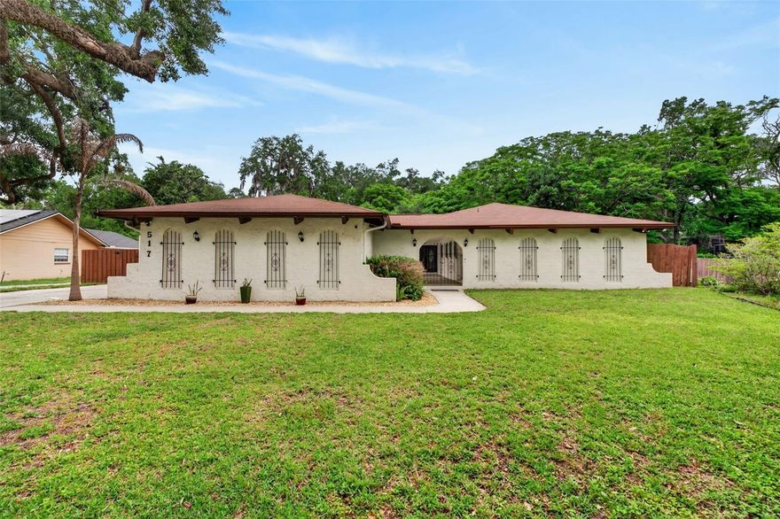 Tucked along the peaceful banks of the Little Wekiva River, this four bedroom, two bathroom Spanish Mediterranean style home offers character, privacy, and everyday convenience. From the moment you arrive, the charming courtyard entrance sets the tone, welcoming you into a space filled with warmth, architectural detail, and timeless appeal.

Inside, arched doorways, a brick fireplace, and custom built-ins in the living room create a picture perfect setting, especially during the holidays. French doors open to both the courtyard and back porch, seamlessly blending indoor and outdoor living for effortless entertaining. The home offers a thoughtful layout with a perfect balance between open concept living and well defined spaces.

The kitchen features appliances updated in 2022 along with upgraded sink and modern hardware. Natural light flows throughout the home, highlighting updated light fixtures, ceiling fans, and a freshly repainted interior completed in 2026. New tile flooring has been added in the laundry room and Jack and Jill bathroom. 

This home uniquely offers two primary bedrooms, perfect for hosting guests or multi generational living. The main primary suite features private exterior access, a beautifully updated bathroom with soft close drawers, an upgraded medicine cabinet, and a newly custom designed walk-in closet.

Roof installed in 2017, HVAC from 2012, and a water heater replaced in 2014. The AC vents were professionally cleaned just six months ago, adding to the home’s well maintained condition.

Step outside to your own private retreat where a screened in porch overlooks the pool and spa, with the pool reaching a depth of eight feet. The fenced backyard offers both space and privacy, surrounded by beautiful mature oak trees in both the front and back yard that provide shade, comfort, and a true sense of Florida living.

Located just 7 minutes from I-4 and only 3 minutes from Costco, Target, Home Depot, and Walmart, convenience is at your doorstep, with Starbucks just a 12 minute walk away. The community is known for being warm and neighborly, where residents truly look out for one another.

With low HOA fees and a prime location near shopping, dining, and entertainment, this home offers the perfect balance of tranquility and accessibility. Schedule your private showing today.