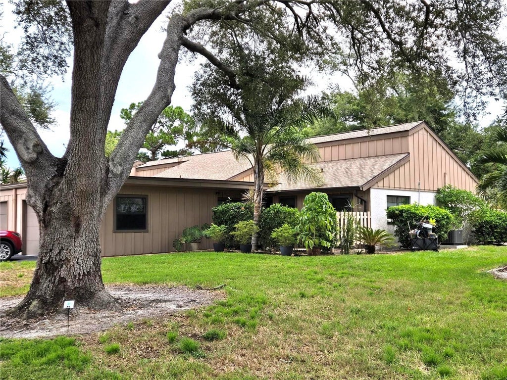 Photo of 5699 Westwind Ln, Sarasota, FL 34231 (MLS # A4705667)