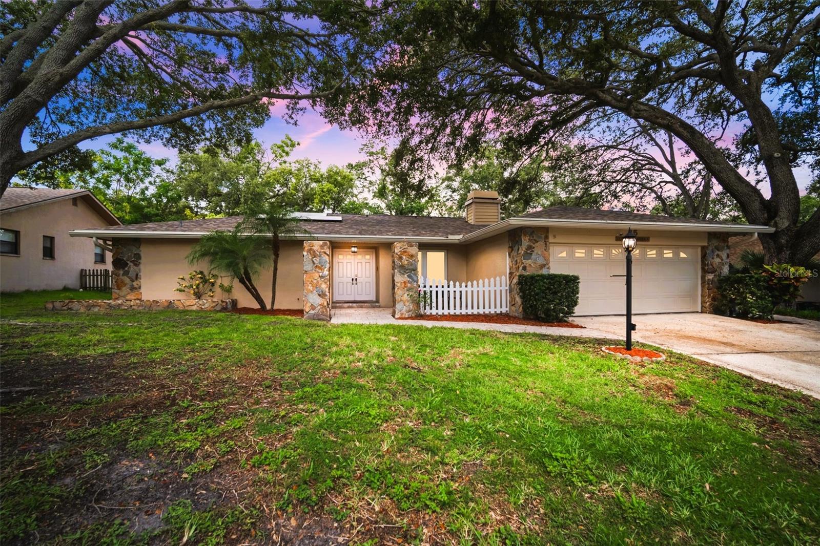 Welcome to your dream retreat in the beautiful and highly-coveted city of Safety Harbor, nestled within the desirable community of Northwood East! This well maintained 3-bedroom, 2-bathroom, pool home, offers 1,844 square feet of comfortable living space on a generous 0.22-acre lot (80x120)—perfectly blending charm, function, and location.
Step through the double-door entry into a spacious split floor plan featuring a formal living room, a kitchen-living combo, and a separate dining area. The heart of the home—the kitchen—boasts elegant granite countertops, wood cabinetry with soft-close drawers, a large island with pendant lighting, and sliding doors that open directly to your private pool oasis. The home also features an inside laundry room, a welcoming front cobblestone patio, and a 2-car garage with an expanded parking pad.
Enjoy the best of Florida living with a screened-in heated pool and spa, a spacious covered patio deck, and three sets of sliding doors that create an ideal indoor-outdoor flow from the primary bedroom, living room, and kitchen. The primary suite includes a large walk-in closet and an updated en-suite bath with a roman tub and walk-in shower. The guest bath has also been fully remodeled and includes a walk-in tub/shower combo.
This solid block-constructed home offers peace of mind with a new roof (2023), paid-off solar panels, newer insulated double-pane windows and sliding doors, new blinds, rain gutters, and is not in a flood zone.
Located in the charming and vibrant community of Safety Harbor, this home offers unparalleled access to the best of the Florida lifestyle. Just minutes from downtown Safety Harbor, you’ll enjoy a quaint small-town atmosphere filled with eclectic shops, restaurants, the world-renowned Safety Harbor Resort and Spa, a marina, parks, and lively festivals. Outdoor enthusiasts will love the proximity to Philippe Park, Lake Chautauqua Park, the Pinellas Trail, and award-winning Gulf Coast beaches like Clearwater Beach and Honeymoon Island.
Centrally located with easy commutes to Tampa, St. Petersburg, and two international airports, you’re also close to top-rated Pinellas County schools, shopping centers, Countryside Mall, and world-class medical facilities including Mease Countryside Hospital.
It’s not just a home—it’s a lifestyle. Come see why everyone falls in love with Safety Harbor!
