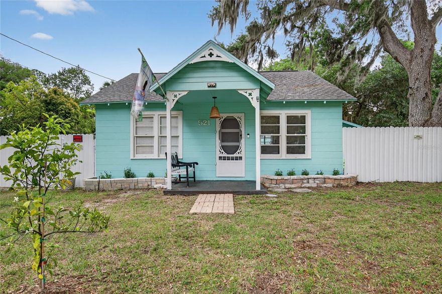 This one-of-a-kind property offers an incredible investment opportunity in highly sought-after Downtown Mount Dora! Situated on a spacious 100 x 130 ft R2-zoned lot, and located less than a mile from the picturesque historic district within the vibrant golf cart zone, this property is full of charm, flexibility, and income potential. Inside, you’ll find two bedrooms plus a versatile bonus room currently used as a dining space—perfect for entertaining. The home has been thoughtfully refreshed with stylish new flooring and an open-concept kitchen that creates a warm, inviting atmosphere. Beyond the privacy fence, there is a cement pad with an rv/camper hook-up offering a truly unique second rental or a family compound experience. This whimsical retreat includes a private fire pit for cozy evenings, a charming outdoor dining patio with BBQ space, and even a refreshing private outdoor shower. The concert pad has is public sewer, and an additional hookup is available for another RV, providing even more flexibility. The property also includes a newly constructed, fully permitted 12x24 storage building adding both functionality and convenience. With no HOA, you’ll enjoy the freedom to park your boat, and you’re just moments from Gilbert Park with a public boat ramp for days cruising through chain of lakes . Plus, you’re only a couple of blocks from the unique shops, dining, and charm that make Mount Dora one of the top towns to visit in the state of Florida. For future development, the R2 zoning offers exciting potential, allowing additional housing options once the lots are separated. Buyer is to do their due diligence.