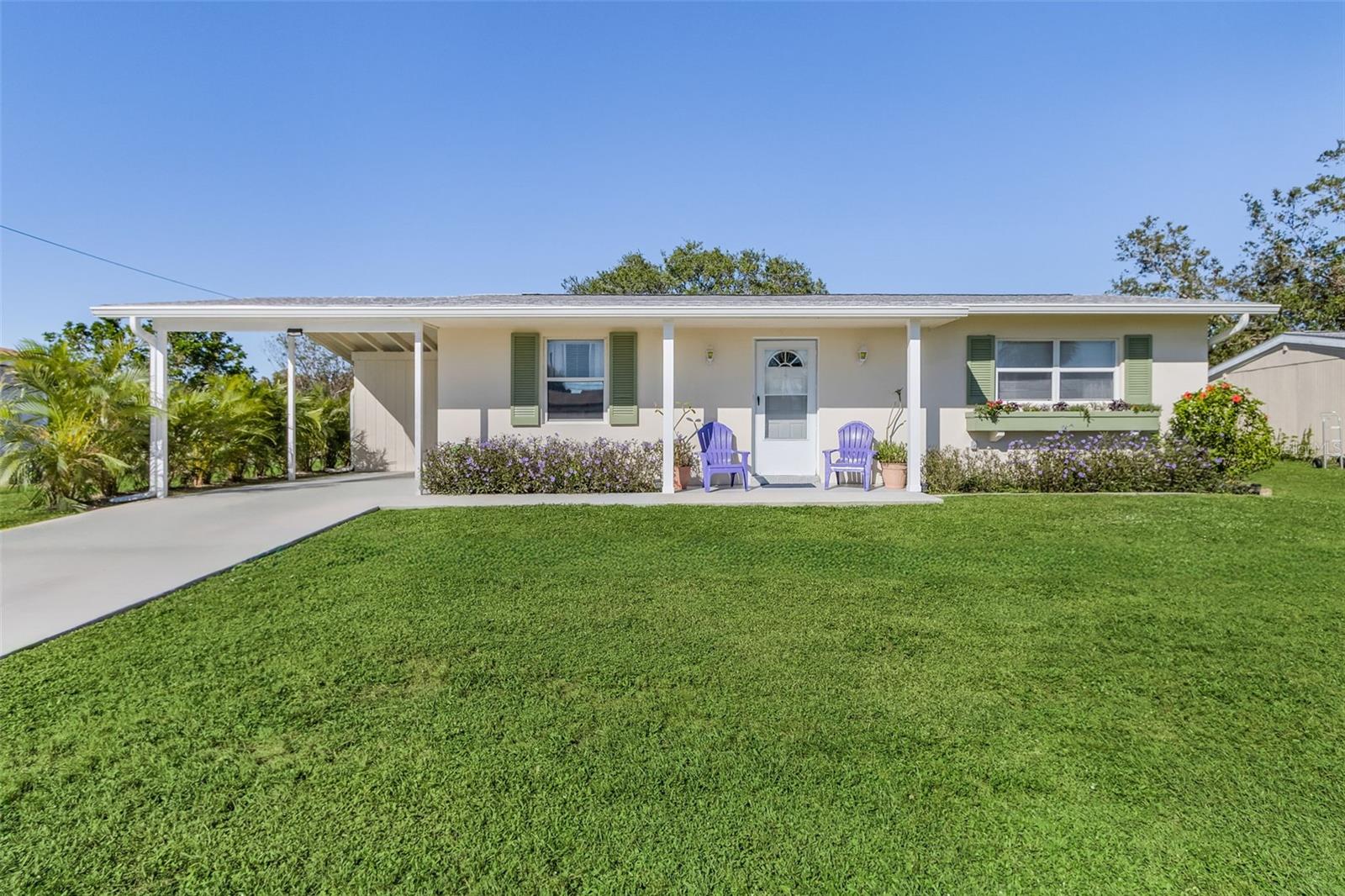 Welcome to this charming freshly painted block home, located in a well established low traffic, quiet neighborhood with sidewalks. The open floor plan features a comfortable living room which flows into the dining area. The kitchen is well equipped with plenty of counter space and designed for easy meal preparation. It boasts solid wood cabinetry and stainless appliances. The sunroom/office is under air and can easily convert to a 3rd Bedroom. The carport storage room houses the water heater, laundry and insulated attic access. The peaceful backyard area is perfect for enjoying Florida's year round sunshine. New Roof, Electric Main and Smart Meter 2022. Underground Electric. Public Water and Sewer. No HOA. Not in a mandatory Flood Zone (x).
The central location means you're just a short drive from shopping, dining options and the stunning Gulf Coast beaches. Englewood Beach (pictured) is 22 miles away. Embrace the relaxed Florida lifestyle and make this charming home your today!