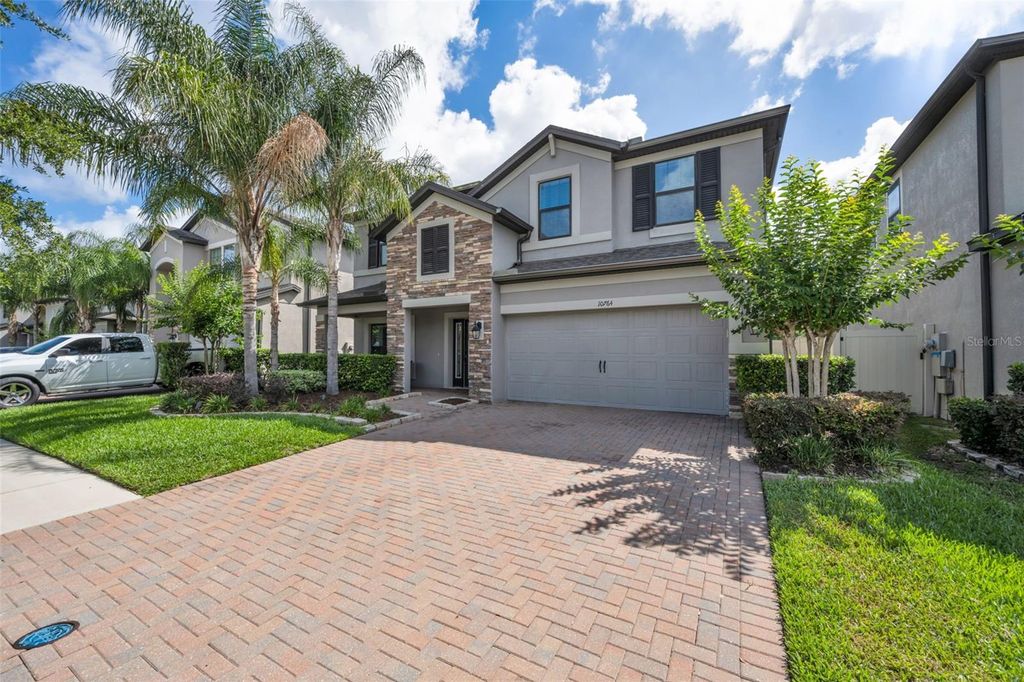 Photo of 10764 Pleasant Knoll Drive, Tampa, FL 33647 (MLS # TB8515058)