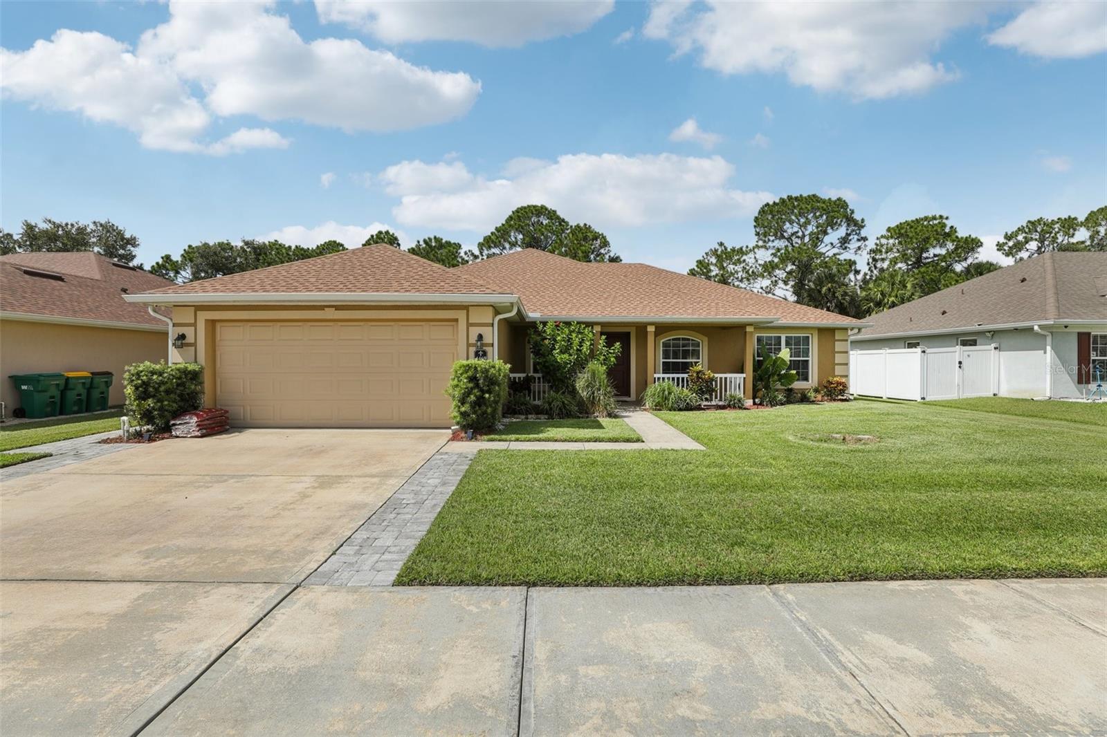 Tucked away in a peaceful, secluded subdivision, this beautifully appointed 3-bed, 2-bath home offers 2,035 sq ft of inviting living space. The kitchen impresses with stone counters, generous storage, and a layout perfect for culinary creativity. The spacious primary ensuite features a large garden tub for unwinding in style. Step outside to a covered patio ideal for relaxing with an afternoon drink. With a newer roof, water heater, and HVAC, plus lush landscaping, this home is move-in ready and made for enjoying the good life.