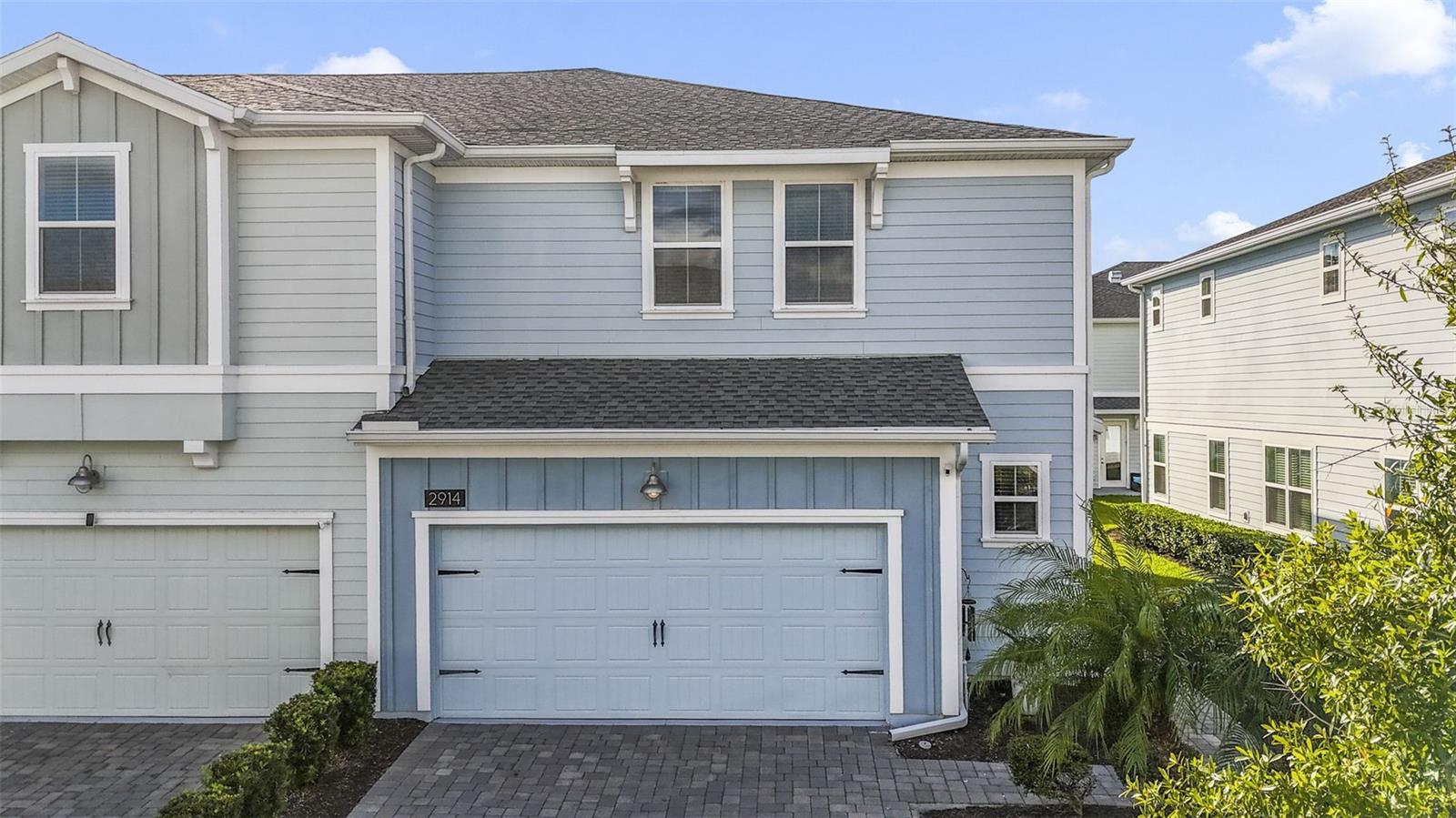 **Seller may consider buyer concessions if made in an offer**Welcome to this beautifully maintained townhouse in the DESIRABLE STOREY LAKE COMMUNITY of Kissimmee! Built in 2018 and offering over 2,000 SQUARE FEET of modern living space, this home feels nearly brand new with LUXURY FINISHES, an open concept design, and RESORT-STYLE AMENITIES just minutes from world-famous attractions. Inside, you’ll find EASY-TO-MAINTAIN ceramic tile flooring throughout the main level, creating a clean, cohesive look that complements the home’s high ceilings and open layout. The chef-inspired Kitchen is both elegant and functional, featuring WHITE 42-INCH CABINETRY, quartz countertops, stainless steel appliances, a breakfast bar, and a pantry for added storage. The Kitchen overlooks the SPACIOUS living area, where natural light fills the room and a FLEX SPACE offers the perfect nook for a home office, reading corner, or play area. A separate Dining area provides an ideal spot for gathering with family and friends, and a HALF BATH completes the first floor for convenience. Upstairs, the split-bedroom floor plan offers privacy and versatility. The Primary Suite is a true retreat, highlighted by a TRAY CEILING, walk-in closet, and a beautifully designed en suite bath with dual sinks, a GARDEN TUB, step-in shower, and private water closet. Two additional bedrooms share a spacious second full bath, and the LAUNDRY ROOM, complete with washer and dryer, is conveniently located on the upper level—making daily life a breeze. All bedrooms feature PLUSH CARPETING and plenty of natural light. Step outside to a small private back patio, where you can enjoy your morning coffee, relax in the evening, or take in the Florida sunshine year-round. Living in Storey Lake means every day feels like a vacation. This gated, MASTER-PLANNED, RESORT-STYLE community presents an incredible list of FAMILY-FRIENDLY AMENITIES, including a tropical pool with lazy river, waterslides, splash pad, fitness center, clubhouse with café/bar, mini-golf, kayak rentals, sports courts, and playgrounds. Whether you’re lounging poolside or exploring the beautiful walking trails, there’s something for everyone to enjoy. LOCATED JUST MINUTES from Walt Disney World, Universal Studios, SeaWorld, and the Orlando International Airport, you’ll also enjoy proximity to The Loop Shopping Center, fine dining, and major roadways like SR 417, Osceola Parkway, and I-4 for EASY COMMUTING. With its luxury finishes, spacious floor plan, and ACCESS TO WORLD CLASS AMENITIES, this beautiful townhouse offers the ultimate combination of comfort, convenience, and Central Florida lifestyle—WELCOME HOME to Storey Lake!