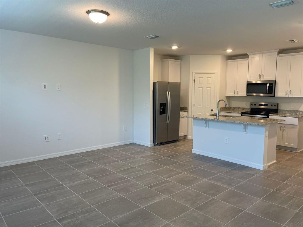 Photo of 16447 Bird Of Paradise Avenue, Clermont, FL 34714 (MLS # O6333210)