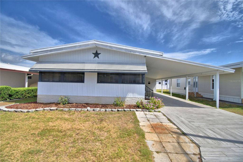 Photo of 4150 Rolling Oaks Drive, Winter Haven, FL 33880 (MLS # P4938593)