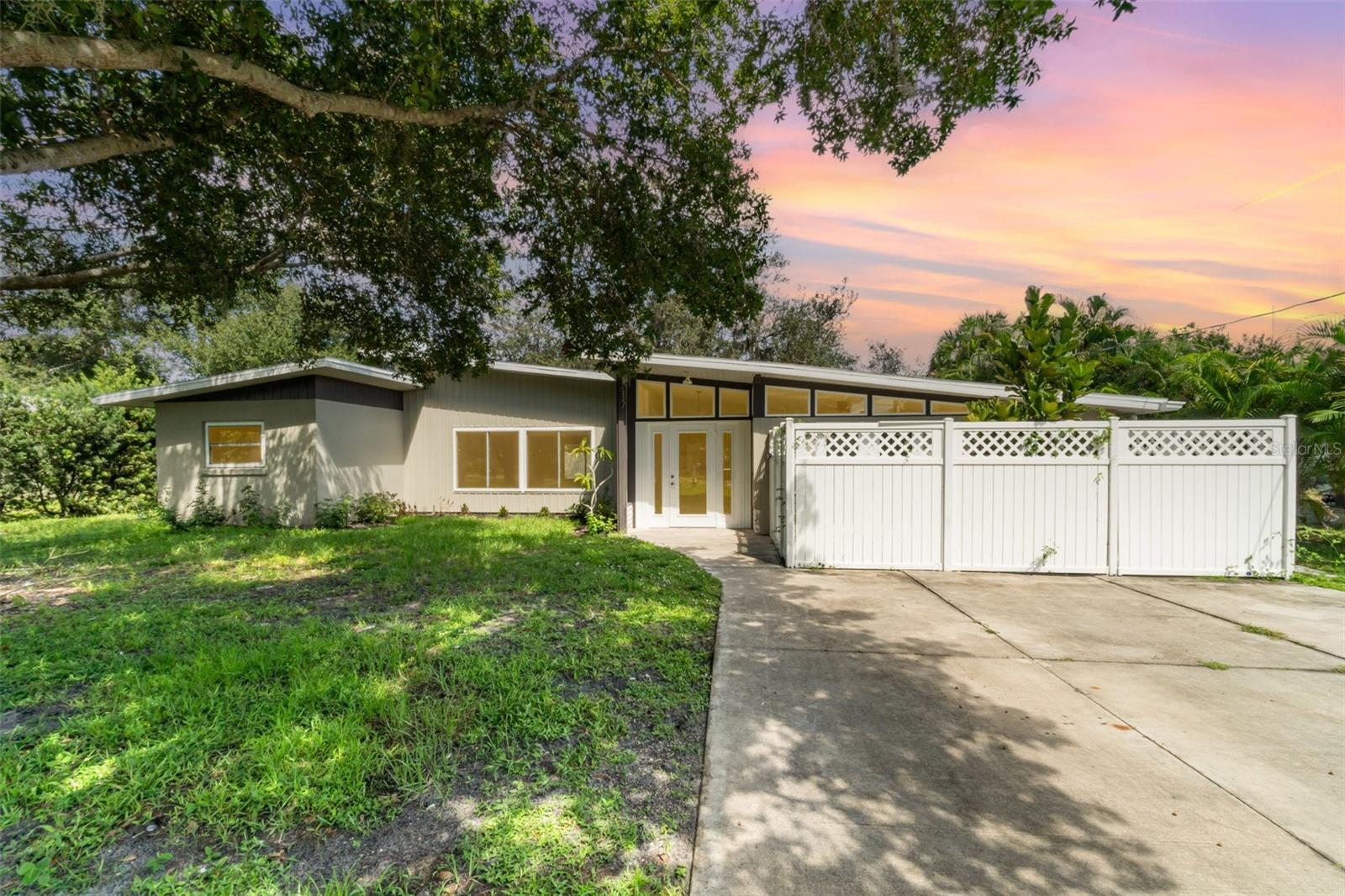 One or more photo(s) has been virtually staged. Live your best Florida lifestyle in this stunning 3-bedroom, 2-bath home perfectly designed with a split floor plan for comfort and privacy. Step into a bright and inviting living room that flows seamlessly into a spacious Florida Room—ideal for entertaining, relaxing, or creating your own versatile spaces.
The kitchen is a true showpiece with brand-new cabinets, quartz countertops, and modern appliances. Freshly painted inside and out in stylish, contemporary colors, this home is move-in ready.
Set on nearly one-third of an acre surrounded by trees, you’ll have plenty of room to design your dream pool or simply enjoy the serenity of the setting. With no HOA, bring your boat, your RV, or both! A private fenced area for boat storage, an RV pad, and two public boat ramps located just east and west make water access effortless. The oversized driveway also provides ample space for guest or owner parking. Brand New Roof!
Don’t miss out—call today to schedule your private showing. This home is priced to sell!