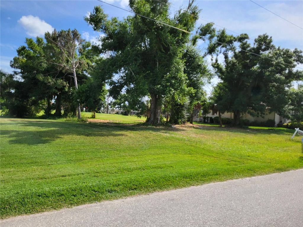 Photo of 68 Long Meadow Place, Rotonda West, FL 33947 (MLS # D6146607)