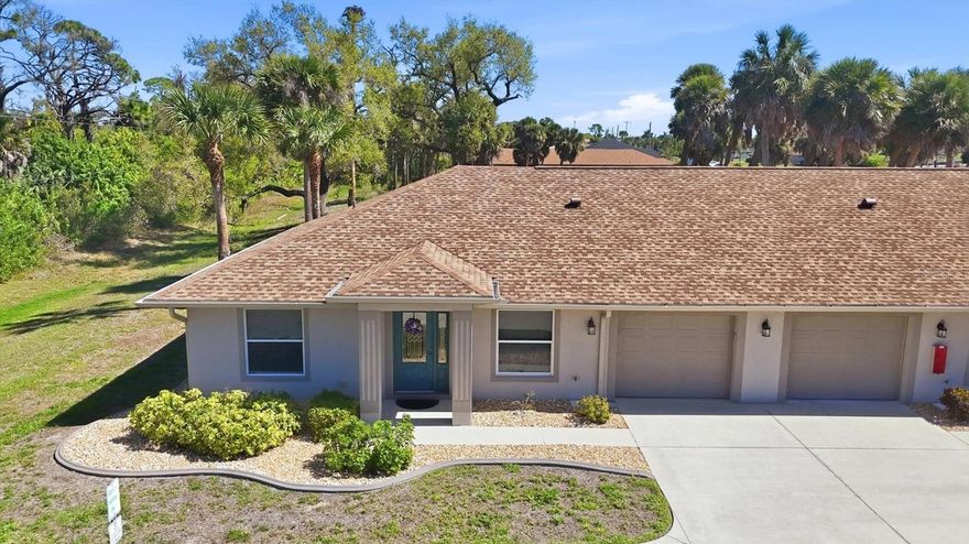 This charming 2005 end-unit VILLA offers 2 bedrooms, 2 bathrooms, and a coveted GARAGE, the perfect retreat for your getaway to PARADISE. Nestled in the desirable Rotonda West community, you'll be surrounded by lush GOLF COURSES and just a short drive to the GULF BEACHES. Located within the intimate Sunset House Condominium Association, only 8 total units, this villa enjoys a serene setting along the peaceful lake. A reasonable monthly fee covers exterior building and grounds maintenance plus access to the sparkling Sunset House COMMUNITY POOL, making ownership effortless. Inside, the home feels open and airy with vaulted ceilings and over 1,200 sq ft of comfortable living space. The kitchen features solid-surface counters, abundant cabinetry, a double-door pantry, and both a breakfast bar and dinette, perfect for casual Florida living. The split-bedroom layout provides privacy for you and your guests. The primary suite includes a spacious walk-in closet and a well-sized bathroom. A pocketing slider opens the living room to the covered, enclosed patio, offering a breezy transition to the backyard and the expansive pavered patio, ideal for morning coffee or sunset unwinding. The 22' x 13' garage easily accommodates a vehicle plus extra storage, an invaluable perk. Off the garage, you'll find a separate air-conditioned utility room with washer, dryer and double closet with shelving for more storage. This villa lives larger than your typical condo, and it's being offered fully furnished. Perfectly positioned in many ways, it delivers the peaceful Southwest Florida lifestyle so many dream of. Don't underestimate, and don't wait, opportunities like this are quickly scooped up.