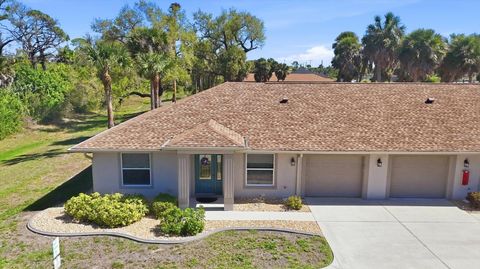 Photo of 347 Boundary Boulevard #103, Rotonda West, FL 33947 (MLS # D6146626)