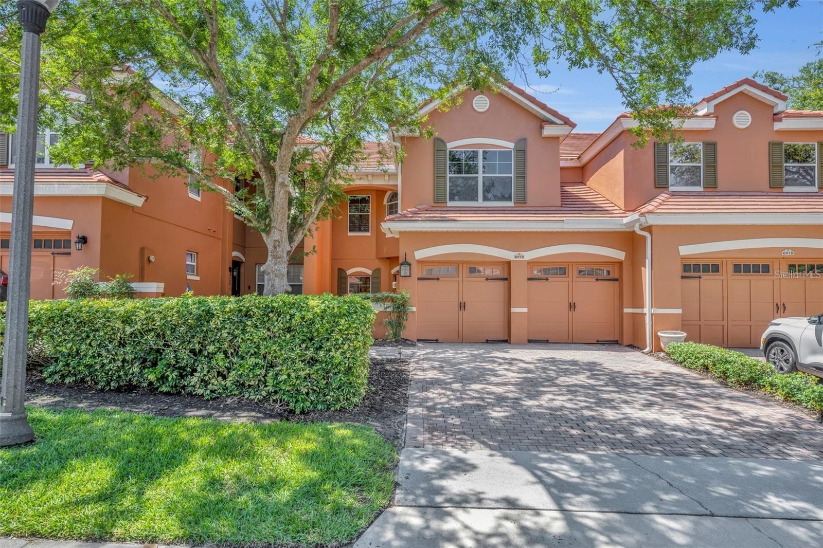 **Gated Community** Experience luxury in this renovated townhome with a professionally enclosed FLORIDA ROOM! This stunning 3-bedroom townhome with an additional loft/office space and 2.5 baths in the gated community of Toscana in Dr. Phillips is the perfect opportunity. You will love this open concept floor plan featuring upgrades galore including 42inch kitchen cabinets, drawers for pots and pans, lazy Susan cabinet,
pantry, watertal Kitchen island. Ouartz counter toos, gourment kitchen, stanless steel apoliances, rea hardwood floors throughout tirst floor custom plantation shutters throughout the house, double height ceilings in foyer and living room. New A/C 2024. The Spacious Master suite has large walk-in closet, tray ceilings, a luxurious bathroom featurina stand alone bathtub, separate shower, dual sinks all with an impeccable modern touch. You have to see the relaxing and lush private patio, a new florida room and covered lanai. The community features a resort style pool and Spa, Fitness Center and Club House. Great location steps away from restaurant row, Universal Studios, Whole Foods. Quick access to I-4 Plus,
enov peace of mind with the OA coverind lawn care, exterior maintenance, tie root, and security. Tis desirable location outs you nea Restaurant Row, International Drive, and major attractions. Easy access to I-4 makes exploring Orlando a breeze. The community itself offers a clubhouse, pool, and fitness center for relaxation and recreation. Don't miss out on this incredible opportunity!**LOCATION is the key as this home is in the heart of Dr. Phillips walking distance to the high school and top-rated Dr. Phillips Elementary. Your Florida visitors will truly enjoy being minutes from the theme parks including Universal, Sea World and Disney World.