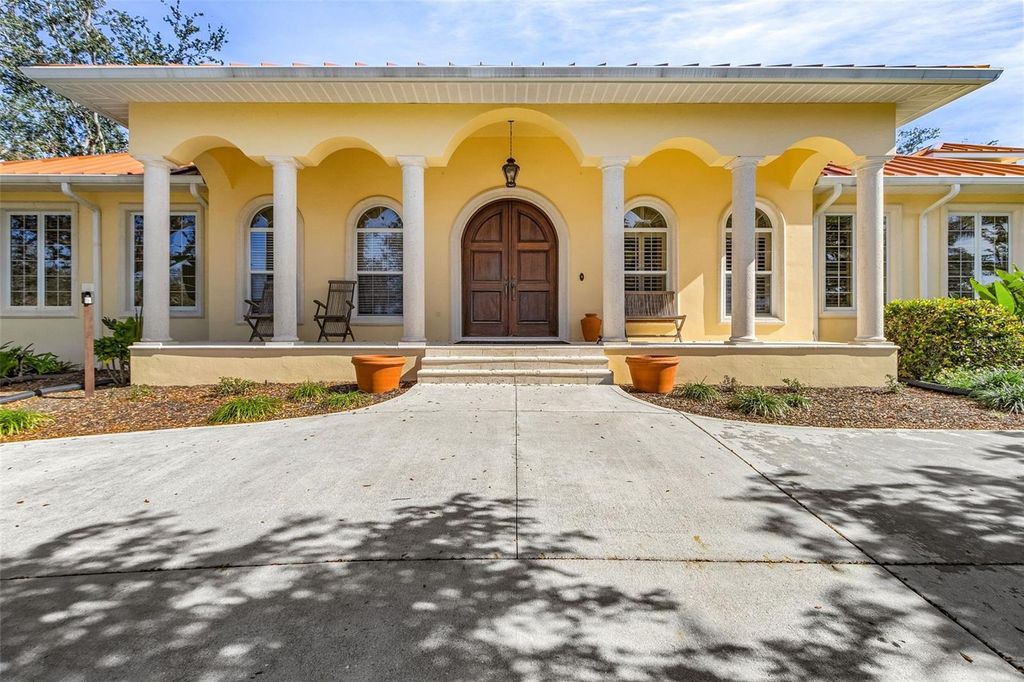 Photo of 21370 Harborside Boulevard, Port Charlotte, FL 33952 (MLS # C7520177)