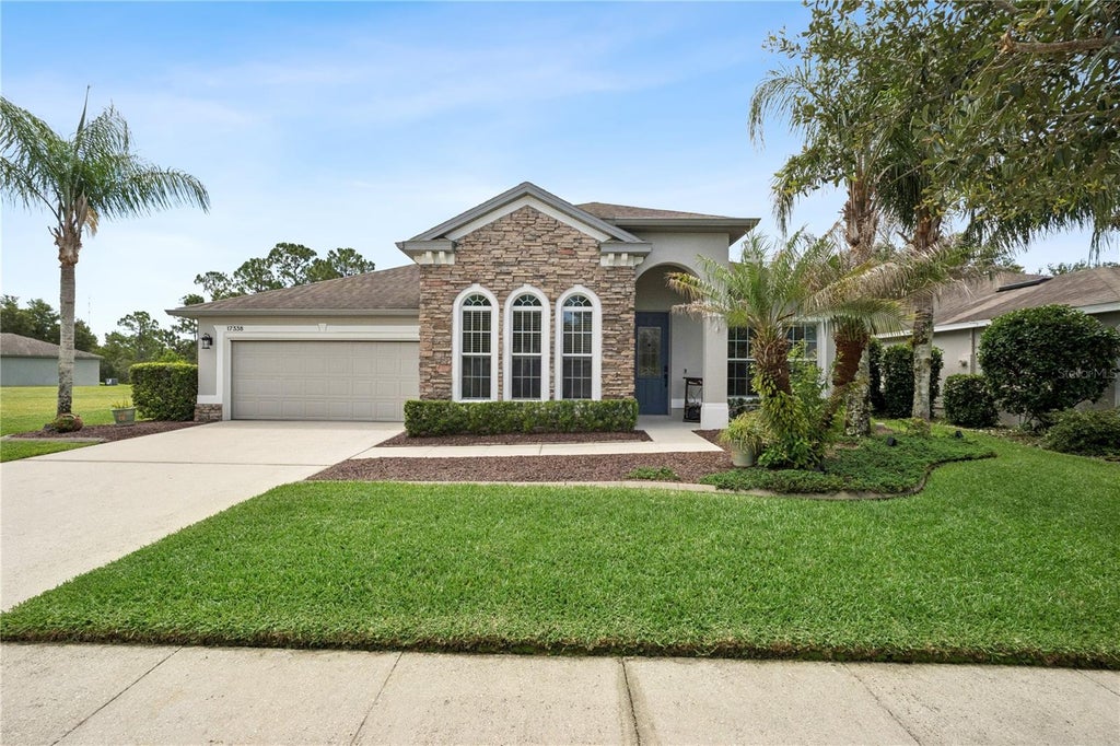 Photo of 17338 Cypress Preserve Parkway, Orlando, FL 32820 (MLS # O6415111)