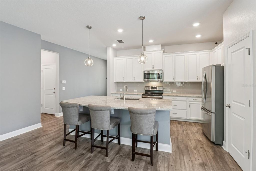 Photo of 17134 Hickory Wind Drive, Clermont, FL 34711 (MLS # O6397774)