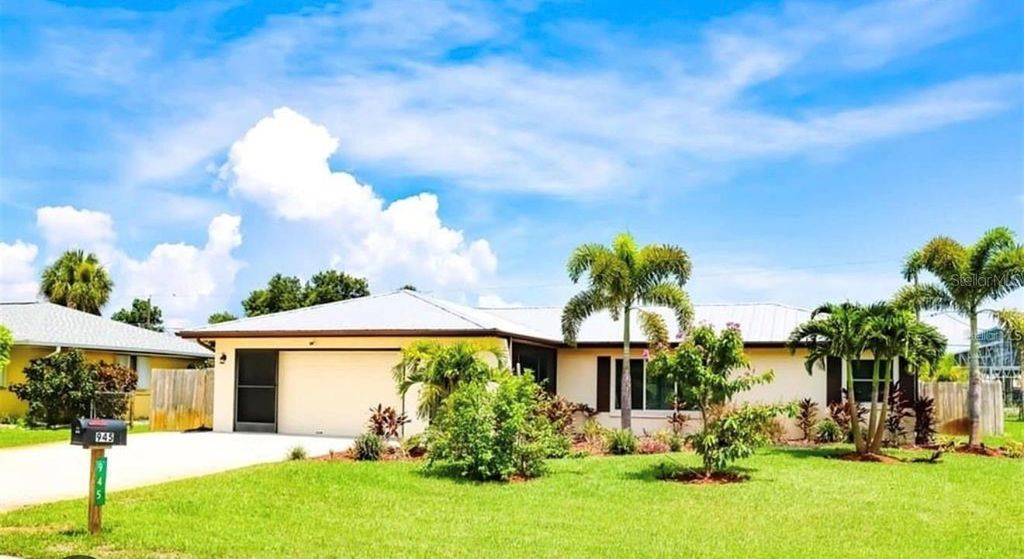 Photo of 945 Chevy Chase Street, Port Charlotte, FL 33948 (MLS # O6390350)