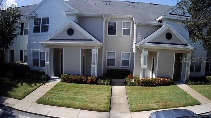 Spacious 3-bedroom, 2-bath condo with an attractive traditional design and an open floor plan that makes daily living easy. The entry foyer with a closet is on the first floor, while all living spaces are located upstairs for added privacy. Features include built-in accents, a laundry room conveniently off the kitchen, and ceiling fans throughout. The community offers resort-style amenities including a sparkling pool, fitness center, basketball and tennis courts, playground, and outdoor grills near the pool area—perfect for both active living and relaxation.