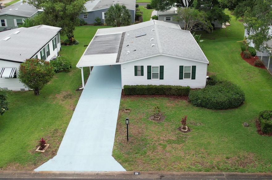 Are you ready to enjoy the Casual Florida Lifestyle? Edgewater Landing is a 55+ community located on the Intracoastal Waterway.  You own your lot in this community. Located conveniently to shopping, dining, US1,  I-95, and is only a short drive to the Atlantic Ocean. The front gate entryway is manned 24 hours per day.
 
This elevated lot home is ready for new owners! Upon arrival, you will feel right at home as you enter through the kitchen/dining area. The open concept and the vaulted living room ceiling makes this area feel spacious and welcoming. The vinyl windows throughout the home have faux marble window sills.  The primary bedroom has double closets and a private bathroom with a walk in shower.

The home is surrounded by mature landscaping which provides a cozy setting when you are enjoying your private screened in porch. Right outside the large screened porch is the perfect patio for grilling. You will enjoy living and entertaining in this home!

This active community offers many amenities, just to list a few: a fishing pier, a boat launch, a Boat/RV/Kayak storage area-based on availability, a woodworking shop, exercise room, tennis/pickleball courts, a heated pool, shuffleboard, horseshoe pits, a clubhouse, and walking trails.

Perfect for year around living or use as a Winter Retreat.

ALL INFORMATION IS ASSUMED ACCURATE BUT NOT GUARANTEED. ALL MEASUREMENTS ARE APPROXIMATE. BUYERS AND THEIR AGENTS SHALL VERIFY ANY INFORMATION DEEMED IMPORTANT. ;Water: City