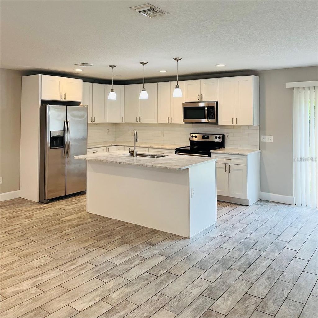 Photo of 5154 Glasgow Avenue, Orlando, FL 32819 (MLS # O6410091)
