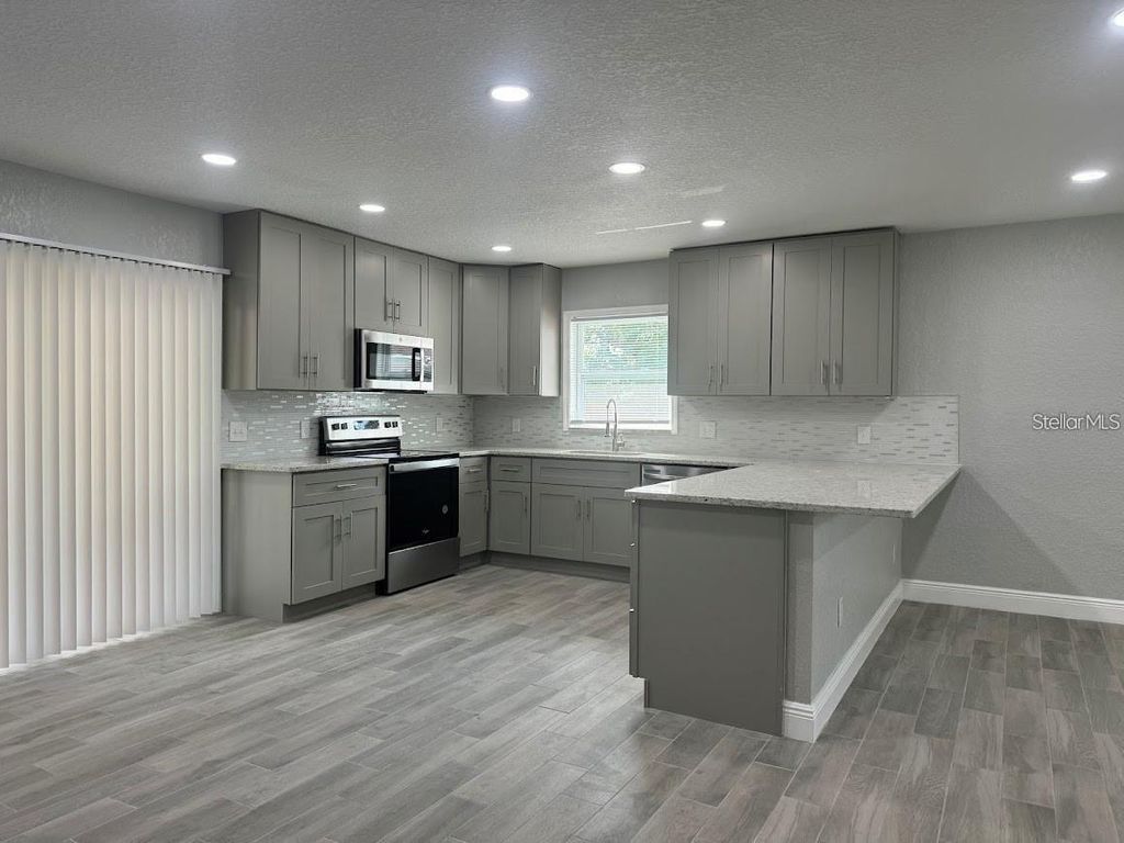 Photo of 1916 Verano Drive #1916B, Haines City, FL 33844 (MLS # O6395039)