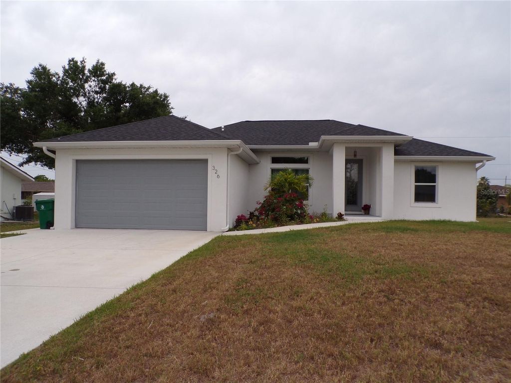 Photo of 326 Millport Street NW, Port Charlotte, FL 33948 (MLS # C7492868)