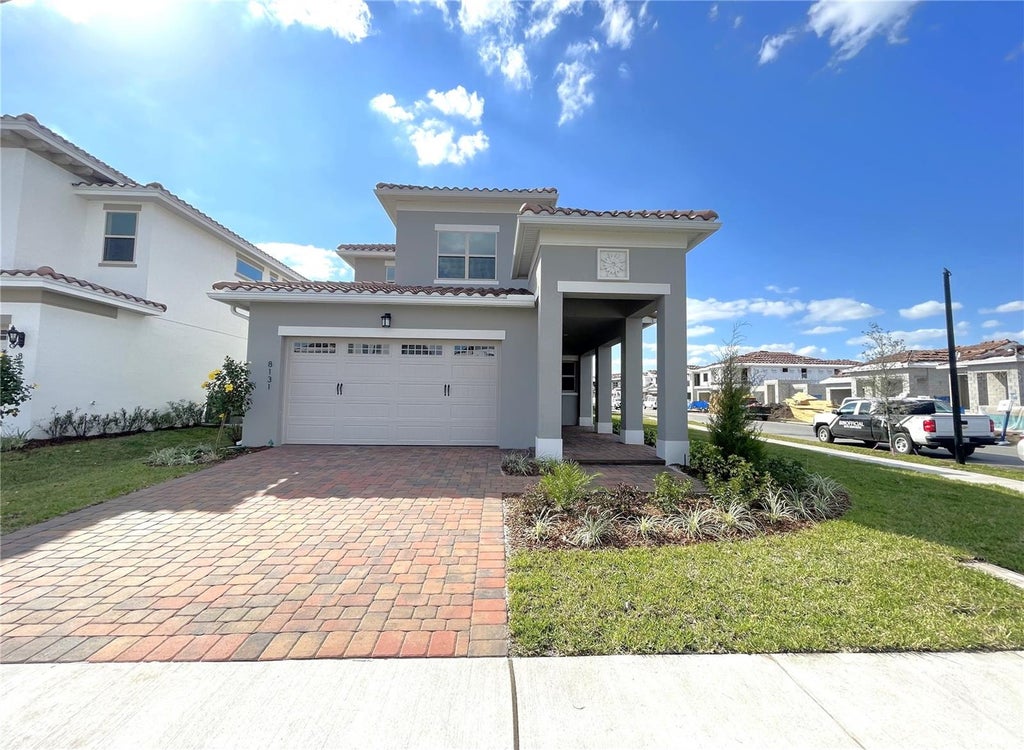 Photo of 8131 Mabury Lane, Orlando, FL 32832 (MLS # O6449400)