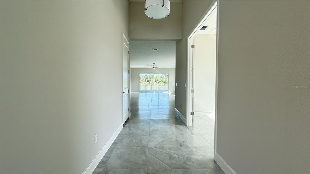 Photo of 32523 Neroli Street, Wesley Chapel, FL 33543 (MLS # TB8384851)