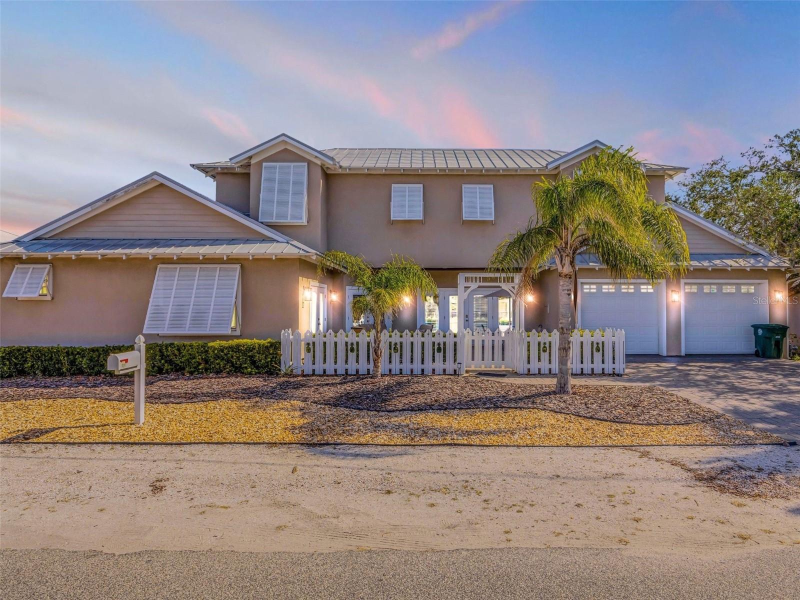 A Rare Coastal Gem! Prestigious Beachside Residence Just Steps from Flagler Avenue and the Atlantic Ocean
Welcome to an unparalleled expression of coastal sophistication in the heart of New Smyrna Beach. Situated just 200 feet from the legendary Flagler Avenue and mere steps from the Atlantic shoreline, this custom-crafted residence offers the ultimate blend of location, luxury, and lifestyle. Nestled on the same charming street as the celebrated Garlic Restaurant, this is more than a home it’s an invitation to experience life at its finest.
Built in 2014 with exceptional craftsmanship and meticulous attention to detail, this 3,000-square-foot contemporary masterpiece is the epitome of refined beachside living. Designed for those who value elegance and functionality, the home features three expansive bedrooms, each with a private en-suite bath, plus a stylish half-bath for guests. With accommodations for 12 or more, the residence offers effortless versatility ideal for extended families, entertaining, or generating rental income in one of Florida’s most coveted coastal communities.
From the moment you enter, the home envelops you in understated luxury. Cathedral ceilings enhance the spacious open-concept living area, while rich Bellawood Acacia hardwood floors celebrated for their durability and warmth set the tone for enduring quality. Oversized windows and French doors flood the space with natural light, creating a serene ambiance infused with coastal breezes.
At the heart of the home lies a gourmet kitchen that balances style and functionality. Outfitted with stone countertops, a large breakfast island, and premium gas appliances including a cooktop, dryer, and water heater it’s a space designed for everything from everyday meals to unforgettable gatherings. Whether you’re entertaining a dozen or enjoying a quiet evening for two, the setting is always extraordinary.
Two luxurious primary suites—one on each level offer the ultimate in privacy and comfort, featuring walk-in closets, custom built-ins, and premium finishes. The third en-suite bedroom continues the home’s commitment to elevated design. Dual laundry areas upstairs and down offer practical convenience for multi-generational living or long-term stays.
Throughout the home, high baseboards, crown molding, and a seamless blend of hardwood, engineered wood, and porcelain tile reflect thoughtful design and timeless appeal. This is a home that doesn’t just meet expectations, it redefines them.
The exterior delivers equal appeal, with an oversized two-car garage and additional driveway space for six vehicles. Low-maintenance landscaping surrounds the property, an outdoor shower, french doors, and generous storage add both beauty and practicality.
With surfing, shopping, dining, and Flagler Avenue’s charm all within walking or golf cart distance, this location is the pinnacle of coastal living.
Move-in ready and available with curated furnishings, this residence is ideal as a primary home, luxury retreat, or high-end investment with strong rental potential. Located next to our office, we’re available daily for private showings. The sellers are motivated, and all serious offers are welcome.
This is more than a home, it’s a rare opportunity to claim a piece of New Smyrna Beach’s most sought-after coastal corridor. Where timeless design meets the endless horizon, your next chapter begins.
Schedule your private tour today and experience the essence of beachside luxury.