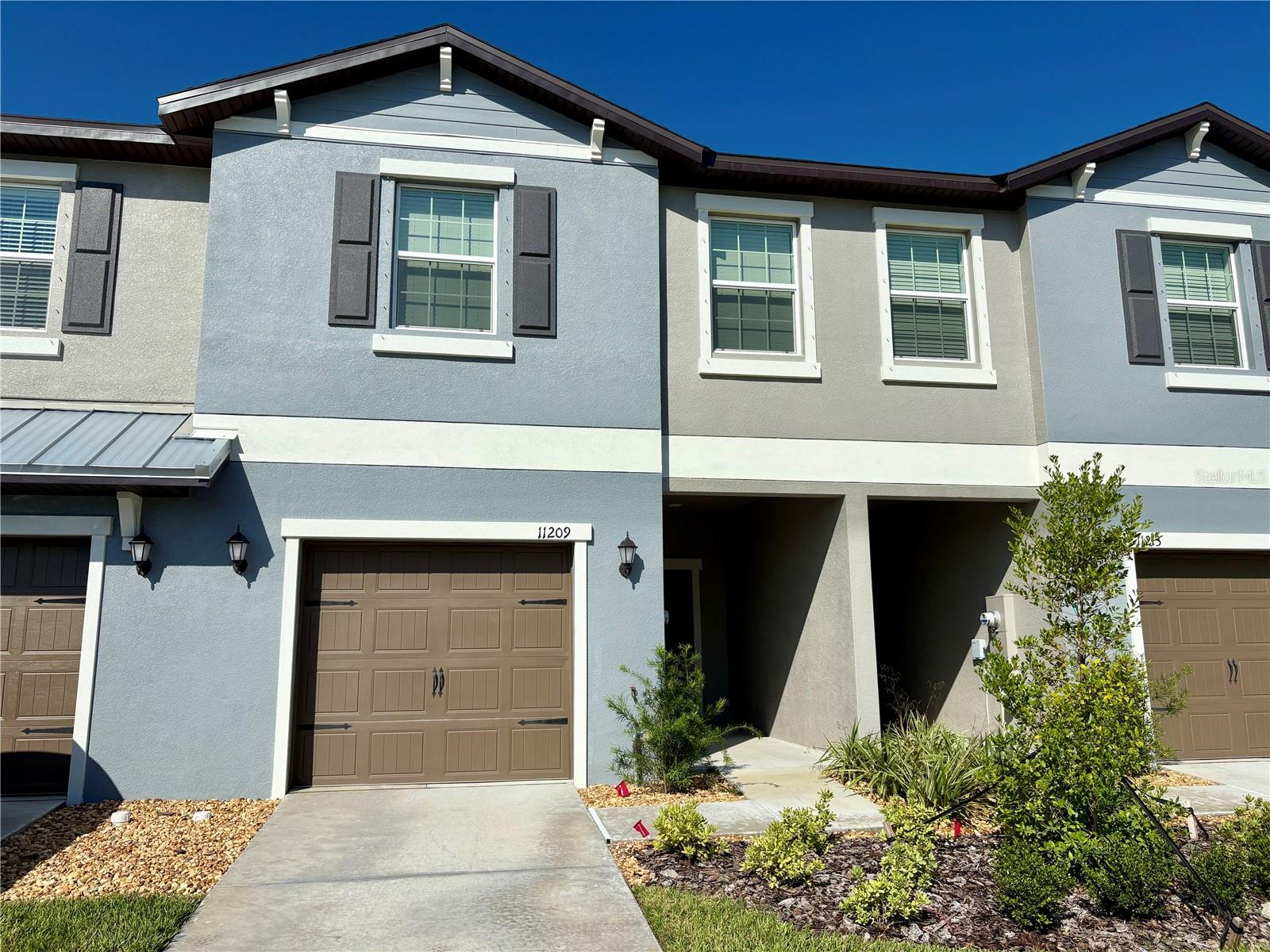 For Rent! Available for immediate move-in! Welcome home to this brand new spacious and modern 3-bedroom, 2.5-bathroom townhome in the desirable Palmetto area! Perfectly designed for both comfort and function, this two-story home offers a versatile layout and thoughtful upgrades throughout. Step inside to find an open-concept main floor with a bright living and dining area that flows seamlessly into the kitchen. The kitchen features stainless steel appliances, ample cabinetry, and a breakfast bar—ideal for both entertaining and everyday meals. A convenient half bathroom is also located on the first floor. Upstairs, you’ll love the additional living space provided by the loft area, which is perfect for a home office, media room, or play area. The primary suite includes a large walk-in closet and ensuite bath, while two additional bedrooms share a full guest bathroom, offering plenty of space for family or guests. Enjoy outdoor living with your private patio that is soon to be screened-in and take advantage of the community’s convenient location with easy access to shopping, dining, and I-75 for commuting to Sarasota, Bradenton, St. Pete, or Tampa. Washer & Dryer included with unit. Maintenance free with lawn care, irrigation, and basic internet included!