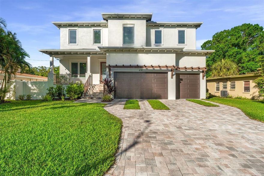 Welcome to the waterfront enclave of Davis Islands and this beautiful custom designed home.  This is where coastal charm meets modern design for a meticulously crafted home. As you cross the threshold you will immediately appreciate the high 10’ ceilings and exquisite wide-plank wood flooring that gracefully flows throughout the residence.  The inviting open floor-plan consists of an oversized great room with gas burning fireplace, coffered ceilings, built-in cabinetry and crown molding.  Designed to delight the chef in you, this gourmet kitchen is truly a treat, with large central island that includes plenty of seating and storage.  The appliance package is top-of-the-line Wolfe 6 burner gas range and exhaust, Subzero refrigerator, two dishwashers  and under counter drawer microwave.  The kitchen has white wood cabinetry, soft close drawers and cabinets, sparkling quartz countertops, two separate sinks and a capacious walk-in pantry.  The first floor accommodates a wonderful guest suite with on-suite bath.  This bath has a zero entry shower with frameless glass, quartz countertops and wood vanity.  This level also consists of a secondary pool/guest bath as well as a large mud room which includes one of two laundry facilities; large storage cabinets, quartz countertops and plenty of space for the drop zone.  As you make your way to the second level you are greeted oversized pictures windows that bathe the home in natural light.  Speaking of bathing the primary suite and bath is a sanctuary for relaxation.  The large wet room with freestanding soaking tub, frameless glass enclosure and elegant hex tile is perfect to rejuvenate.  The bath also has a grand quartz vanity with dual sinks, extra storage cabinets and a massive oversized closet which connects to the secondary laundry.  Additional rooms on the second level consist of two oversized guest bedrooms, connected with a large jack-n-jill bath, plus a 5th room that can serve as a bedroom or media room.  This room consists of a large walk-in closet as well as an additional half bath.  As you step outside, a private oasis awaits. The expansive 41’ covered lanai is perfect for alfresco dining, parties or just late night conversations.  The sparking pool is salt filtered, heated and consists of a sun-shelf with ledger lounges and an overflow hot tub. As an added benefit there is yard space for your pet or outdoor activities.  Additionally features of this home include; whole home generator, wood shutters, impact windows and doors, two story concrete block construction, 3 car garage, brick paver driveway, gas tankless water heater, 2 A/C’s, prewired exterior cameras and large front porch. Located on an Island just outside of Downtown Tampa, Davis Islands has become the destination for professional athletes, executives and those who desire living within a walkable community. This home is just two blocks from the Davis Islands walking/biking trail, Seaplane Basin and waterfront. The Davis Islands community has all the amenities you could desire; including the DI Village, Marjory Park Marina, Sandra Freedman Tennis Complex, Tampa General Hospital, Historic Roy Jenkins pool, Peter O Knight airport, public boat ramp, dog parks, walking trail and more. Additionally, located only minutes from Downtown Tampa, Water Street Sparkman Wharf and the Tampa Riverwalk, makes this neighborhood a City within the City. Located in the A rated Gorrie, Wilson, and Plant boundaries.