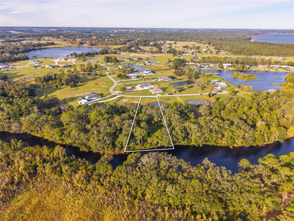 Photo of 3654 Hidden River Ln, Tavares, FL 32778 (MLS # O6359504)