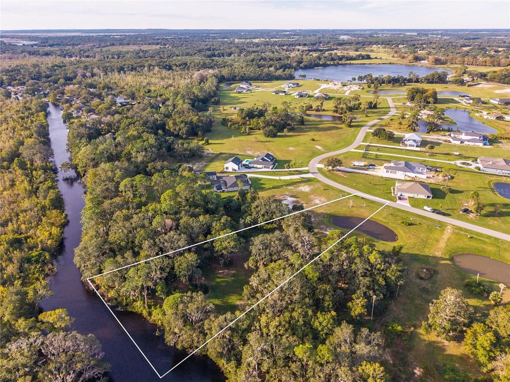 Photo of 3654 Hidden River Ln, Tavares, FL 32778 (MLS # O6359504)