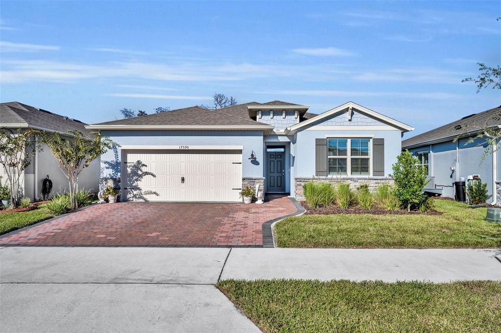 Photo of 17590 Blazing Star Circle, Clermont, FL 34714 (MLS # G5104030)