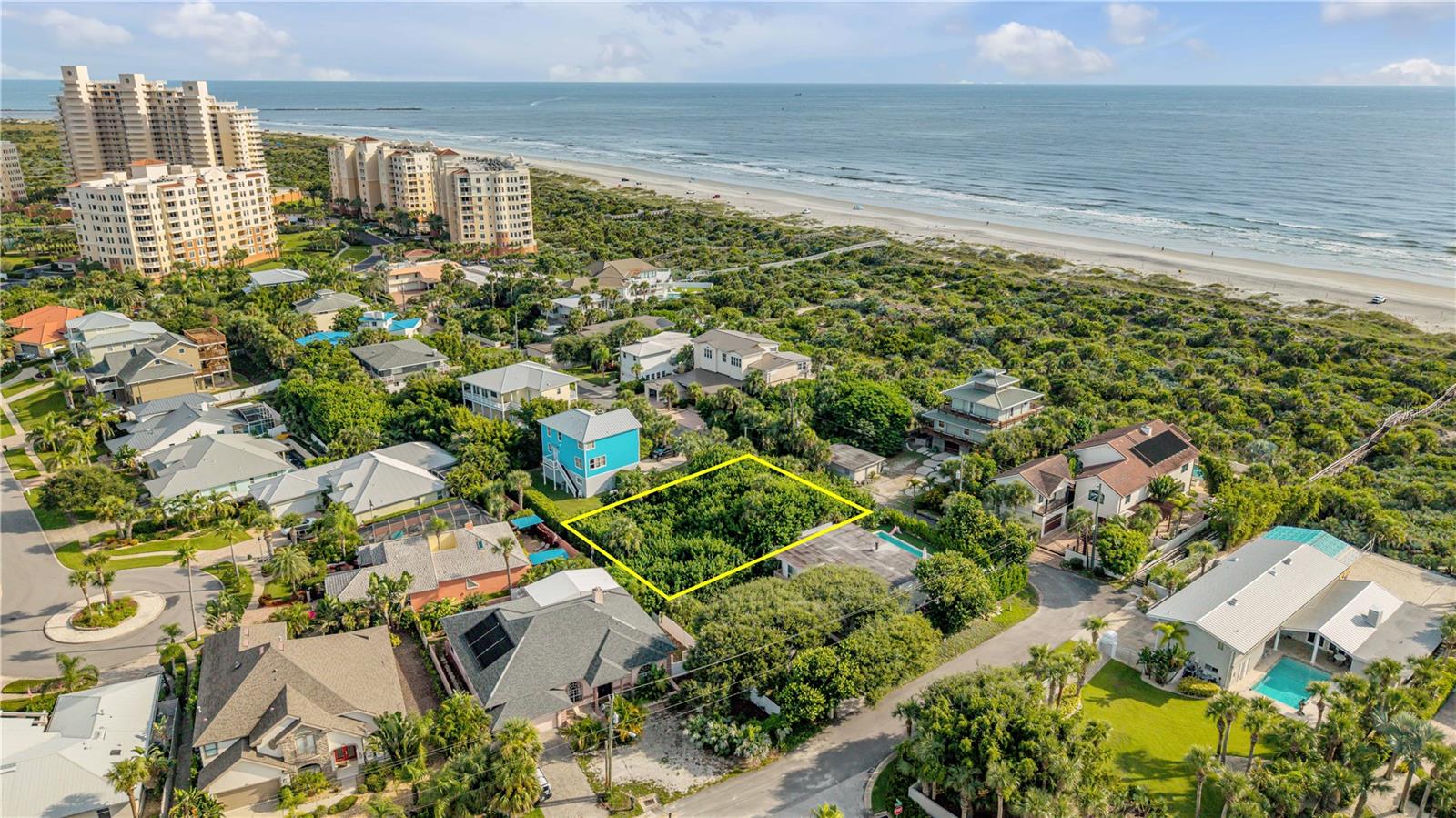 The ONLY VACANT lot with potential Ocean Views in the coveted North Beach neighborhood - one of the quietest sections of the beachside. This 9,545 lot is just a 750' walk to the beach down the County maintained boardwalk just outside your front door. The lot is only .68 mile walk/bike ride to Smyrna Dunes Park and Dog Beach. Flagler Avenue's shops and restaurants are just 1.68 miles away. This location is one of the BEST in town - super quiet, the beach in your front yard, and all the great nature and amenities just a few minutes away.