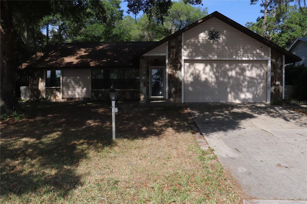 Photo of 1112 NE 130 Terrace, Silver Springs, FL 34488 (MLS # OM722992)