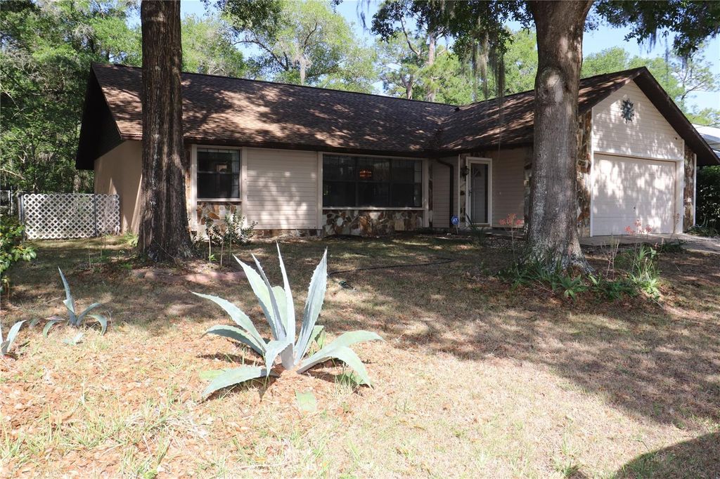 Photo of 1112 NE 130 Terrace, Silver Springs, FL 34488 (MLS # OM722992)