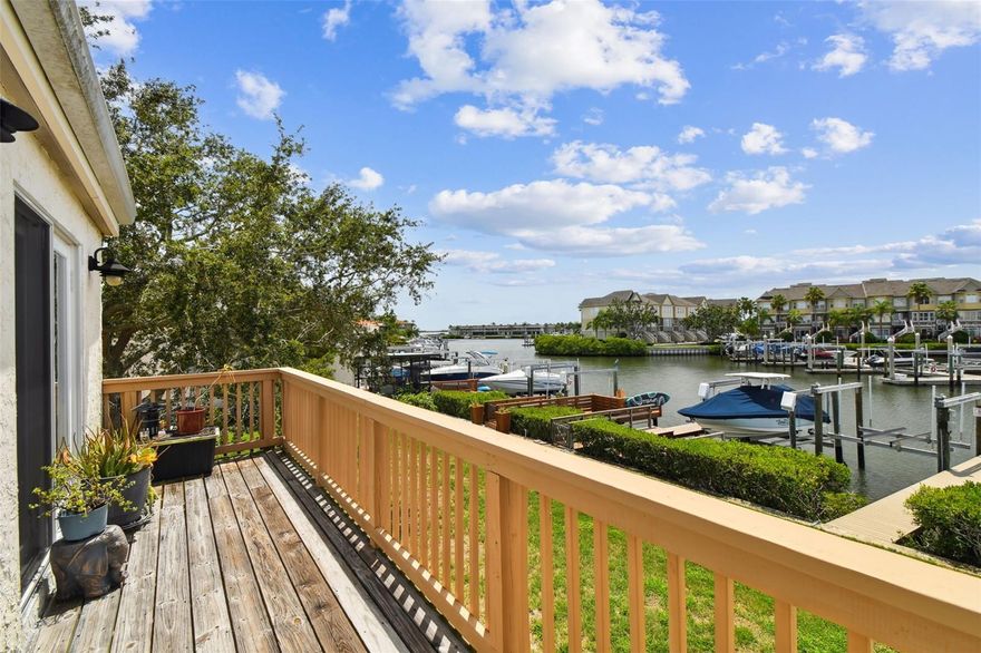 LOCATION! LOCATION! Waterfront Paradise in Spinnaker Cove! MOVE-IN READY WITH APPROVED DOCK PLANS!
Welcome to your waterfront townhome in the beautifully maintained, resort-style community where every day feels like a vacation. This newly remodeled, move-in ready home offers breathtaking water views,  and an opportunity to BUILD YOUR OWN PRIVATE DOCK & LIFT perfect for boating, kayaking, or enjoying the tranquil surroundings. You could boat to your favorite restaurants!

Inside, you'll find CROWN MOLDING THROUGHOUT, NEW LUXURY VINYL PLANK flooring on the main level, and oak wood floors upstairs, all within a thoughtfully designed open floor plan. The chef-inspired kitchen boasts sleek QUARTZ WATERFALL-EDGE COUNTERTOPS that flow seamlessly into the backsplash, 42" shaker cabinets with lots of storage, and all-new stainless steel appliances.

 Upstairs, you’ll find a FLEX SPACE IDEAL FOR A HOME OFFICE.  The spacious primary bedroom opens to a second-story BALCONY with stunning VIEWS OF THE MARINA, offering the perfect spot to enjoy breathtaking sunsets. End your day with a relaxing soak in the JETTED TUB.
Community amenities feature TWO CLUBHOUSES, Olympic-sized pool, tennis, pickleball, and basketball courts, a fully equipped fitness center, and a private marina. For added convenience, boat and RV storage is available, with access to a secure private boat yard for just $40/month. Boat slips, offering electricity + water, are available for $100/month. Recent upgrades: HVAC (2022) with 10-year parts and labor warranty, Water Heater (2019); Metal Roof (2018).

HOA Dues Cover: Insurance (including flood), high-speed internet, cable (200+ channels), roof, exterior maintenance, trash, and ground care.

This home is in a Prime Location: Just minutes to Tampa International Airport, Westshore, International Plaza, and award-winning Gulf beaches, with I-275 and downtown Tampa only 15 minutes away.

Don’t miss your chance to live the waterfront lifestyle - schedule your private showing today!