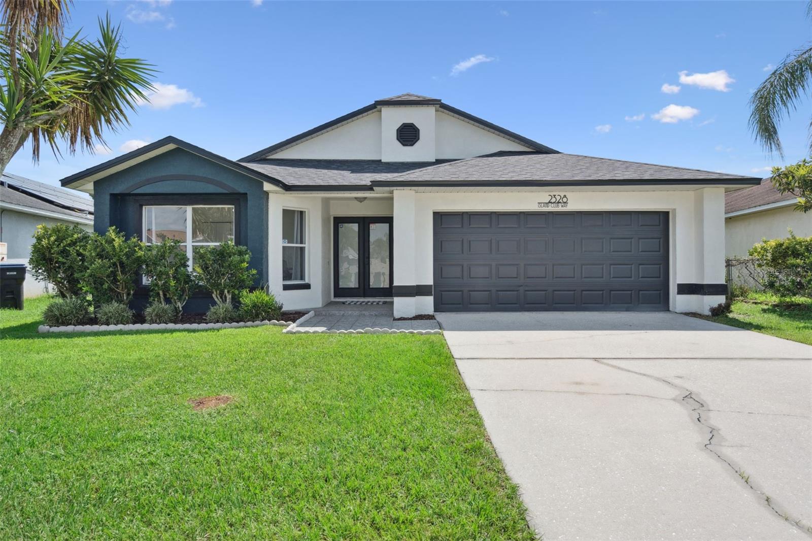 One or more photo(s) has been virtually staged. Welcome home to Island Club at Rio Pinar Lakes, where this beautifully updated 3-bedroom, 2-bathroom single-family home offers ample space, high function, and waterfront views at an appealing price. Stepping inside, the home boasts a split floor plan, an oversized living/family room, and a kitchenette/dining area, providing ample space for living and entertaining. The 2-car garage makes parking and/or storage a breeze. Step out back to your oversized 0.27 acre lot and enjoy the privacy and serenity of having NO REAR NEIGHBORS and an expansive WATERFRONT VIEW! With this much yard space, the opportunities are endless - install a POOL, PLAYGROUND, FIRE PIT and more! The home features an abundance of upgrades and renovations, including a fully RENOVATED KITCHEN, updated WOOD-LOOK TILE in the main living areas, NEW CARPETS in the bedrooms, upgraded LIGHT FIXTURES and CEILING FANS, new SMOKE DETECTORS, a new WATER HEATER, a BRAND NEW ROOF and new SKYLIGHTS, and much more! With a commute time of less than 20 minutes to the University of Central Florida, 5 minutes to Rio Pinar Golf Club, 15 minutes to Orlando International Airport, 30 minutes to Universal Studios, 20 minutes to Downtown Orlando, and 35 minutes to Walt Disney World, this home keeps all that Orlando has to offer at your fingertips. Contact us to schedule your private viewing today!