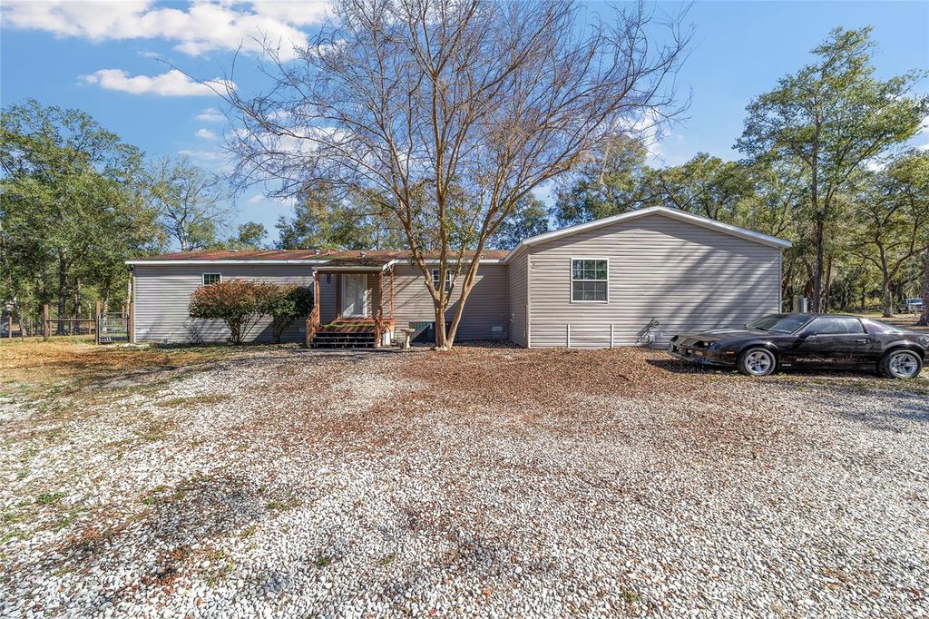 Photo of 39742 Carolina Avenue, Lady Lake, FL 32159 (MLS # OM717442)