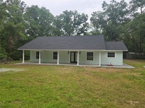 Photo of 438 SW Feather Lane, Fort White, FL 32038 (MLS # GC530745)