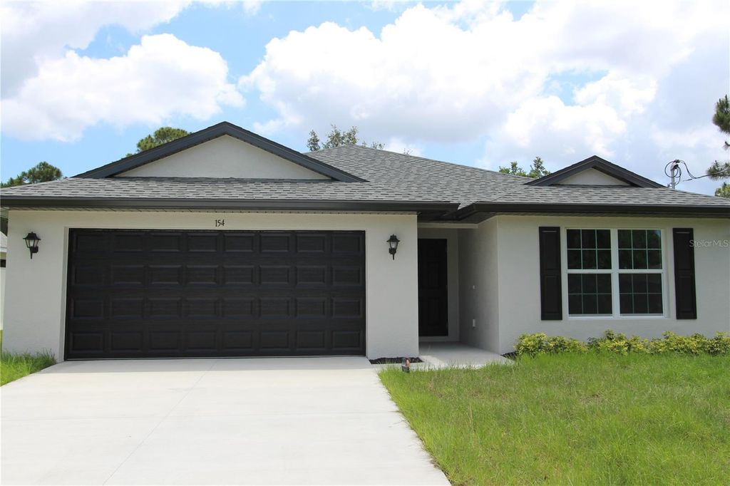 Photo of 154 Australian Drive, Rotonda West, FL 33947 (MLS # D6144699)
