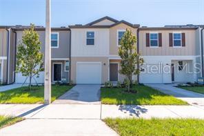 In the desirable MADISON PLACE Community in Davenport, FL, this townhouse boasts 3 bedrooms and 2.5 bathrooms. This interior unit provides privacy while overlooking the pool area. Inside, you'll find a spacious kitchen with stainless steel appliances and granite countertops. The dining room and living area on the first floor are bathed in natural light. Upstairs, three bedrooms provide comfortable living spaces. The master suite features a large walk-in closet. Washer and dryer are included for convenience. MADISON PLACE Community is conveniently located just 3 miles from I4, close to the Florida Hospital, and near the excellent shopping at Posner Park. Community amenities include a swimming pool and playground, with landscape maintenance included.