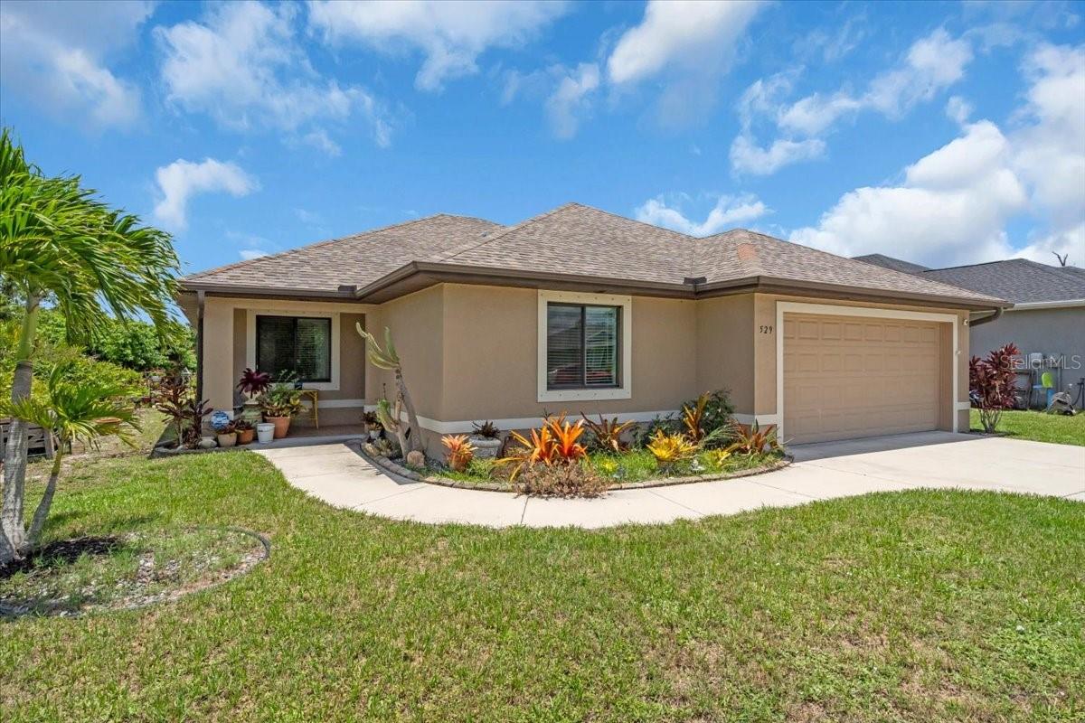 FHA ASSUMABLE 4.2% LOAN OPPORTUNITY! Welcome to this impeccable, nearly new, quality-built custom home featuring 3 bedrooms and 2 bathrooms, crafted by Luke Brothers Custom Homes, a Parade of Homes winner, situated in the quiet neighborhood of Rotonda Heights. Constructed in 2017, this residence was designed for contemporary living and has been meticulously maintained, having sustained no hurricane damage and is not located in a flood zone. The home boasts a NEW HOT WATER HEATER, NEW GARAGE DOOR HARDWARE, and SPRAY FOAM IN ATTIC.
Upon entering through the front door into the expansive family room with its 10-foot tray ceiling, you are greeted by a cozy yet refined ambiance. The kitchen features SOLID WOOD CABINETRY, ample counter space for cooking and entertaining, STAINLESS STEEL APPLIANCES, and GRANITE COUNTERTOPS. It seamlessly flows into the family room and dining area, currently used as a sitting/reading nook. The master bedroom includes a large master bathroom with a substantial walk-in shower and a considerable walk-in closet. This house is perfect for hosting guests. The third bedroom can also function as a den or office. The exquisite tile flooring throughout and high-end finishes set this home apart.
Relax and enjoy your morning coffee or evening cocktail in the peaceful screened-in lanai. The stacking sliding glass doors effortlessly blend indoor and outdoor living spaces. The oversized backyard provides ample space to add a pool and additional outdoor living area.
This home is ideally located within walking and biking distance to A-rated schools, Vineland Elementary and L.A. Ainger Middle School, just 8 miles from Lemon Bay High School, and 10 minutes from Englewood Beach and 20 minutes to Boca Grande. Additionally, it offers proximity to shopping, dining, and all the area's top attractions, ensuring both luxury and convenience. Schedule your private showing today!