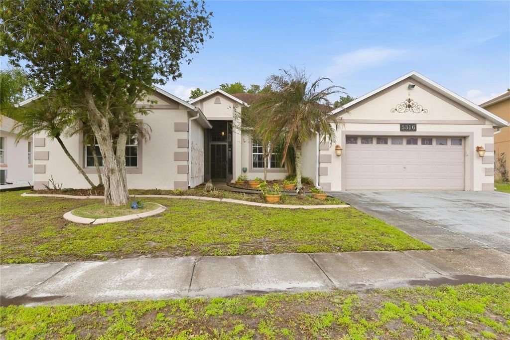 Photo of 5316 Coral Vine Lane, Kissimmee, FL 34758 (MLS # O6396648)