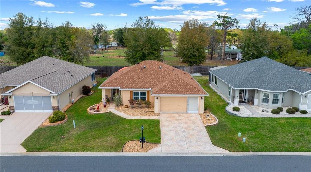 Photo of 13118 SE 86th Circle, Summerfield, FL 34491 (MLS # OM720163)