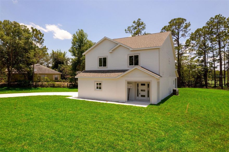 One or more photo(s) has been virtually staged. Stunning BRAND NEW Home with Lake View Balcony & Gourmet Kitchen! Beautifully designed 4-bedroom, 2.5-bath home situated on a spacious ½-acre lot, offering both comfort and style in every detail. Main Floor Highlights: Open-concept layout connects the family room, kitchen, and dining area, perfect for entertaining, Gourmet kitchen featuring a built-in oven and microwave, cooktop, full-size fridge/freezer, and a striking combination of quartz and granite countertops, A large island with a stylish farm sink, surrounded by contrasting cabinetry for added visual interest, Elegant crown molding and durable LVP flooring with 5¼” base molding throughout, Convenient half bathroom for guests. Second Floor Features:  Four spacious bedrooms, including a luxurious master suite with private balcony overlooking a peaceful lake or scenic view, A versatile upstairs loft, perfect for a home office or playroom, Full upstairs laundry room for added convenience, All bathrooms feature porcelain tile flooring and sleek quartz countertops, Consistent LVP flooring throughout the second floor, adding warmth and cohesion. This home perfectly blends modern finishes with functional design. Ideal for families looking for space, luxury, and a serene setting.