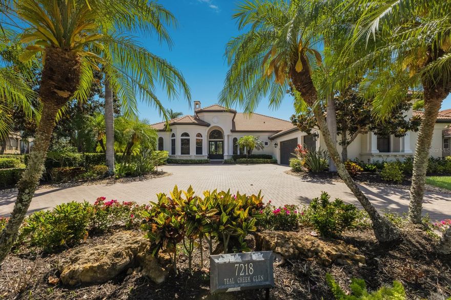 Experience the pinnacle of refined living in this exquisitely renovated 4,200 square foot home, perfectly situated in the exclusive Teal Creek enclave of Lakewood Ranch Country Club. Set on an expansive half-acre lot, the property enjoys a coveted west-facing orientation, offering sweeping panoramic views of the meticulously maintained golf course and a tranquil lake. This distinguished residence is a harmonious blend of classic sophistication and modern luxury, providing an ideal sanctuary for both relaxed family life and elegant entertaining.
Upon entering, you are welcomed into a thoughtfully designed open floor plan that effortlessly flows from space to space. With four generously sized bedrooms, three and a half beautifully appointed bathrooms, and a dedicated home office, the residence is as functional as it is stylish. At the heart of the home lies a breathtaking gourmet kitchen that would inspire any culinary enthusiast. Outfitted with sleek quartzite countertops, custom cabinetry, and premium Wolf and Sub-Zero appliances, this chef’s haven is as practical as it is visually striking.Throughout the four bedroom home, meticulous attention to detail is evident in every finish. Enjoy friends and family in chef's kitchen with quartzite counters, spacious island seating and ice maker!  Retreat to the Bonus room with wet bar and exoctic grantie counters.  The bonus room offers spectacular views of the sunset skies and may be converted to a fifth bedroom with the existing closet! already in place.  Engineered hardwood flooring and large-format porcelain tile lend warmth and elegance, while expansive sliding glass doors frame the picturesque outdoor scenery and invite natural light to pour in. The primary suite serves as a peaceful retreat, offering serene views, a spa-like bathroom, and two generous walk-in closets that provide ample storage and organization.Outdoor living reaches a new level of luxury with a private resort-style oasis that awaits just beyond the glass doors. A beautifully resurfaced pool surrounded by marble pavers, a spa, and a sun shelf create a relaxing and stylish atmosphere, all enclosed by new clear view screens to ensure uninterrupted vistas. An outdoor kitchen and spacious dining area make alfresco entertaining effortless, all set against the stunning backdrop of lush fairways and shimmering lake waters. For pet lovers, the large fenced-in yard provides a safe and spacious area for furry companions to roam freely. Adding yet another layer of comfort and charm, the south side yard features a cozy firepit seating area, perfect for enjoying cool Florida evenings under the stars. This remarkable home is more than just a residence—it’s an opportunity to embrace an upscale Florida lifestyle in one of Lakewood Ranch’s most desirable communities. This home also offers impact glass Sliding doors, impact front door, a Generac Generator that powers the entire home and a water filtration system! Enjoy extremely low HOA fees, this property offers stress-free, high-end living. Rarely does a home of this caliber become available, and with its prime location, thoughtful updates, and unmatched setting, this four-bedroom gem won’t remain on the market for long. Don’t miss your chance to make it yours