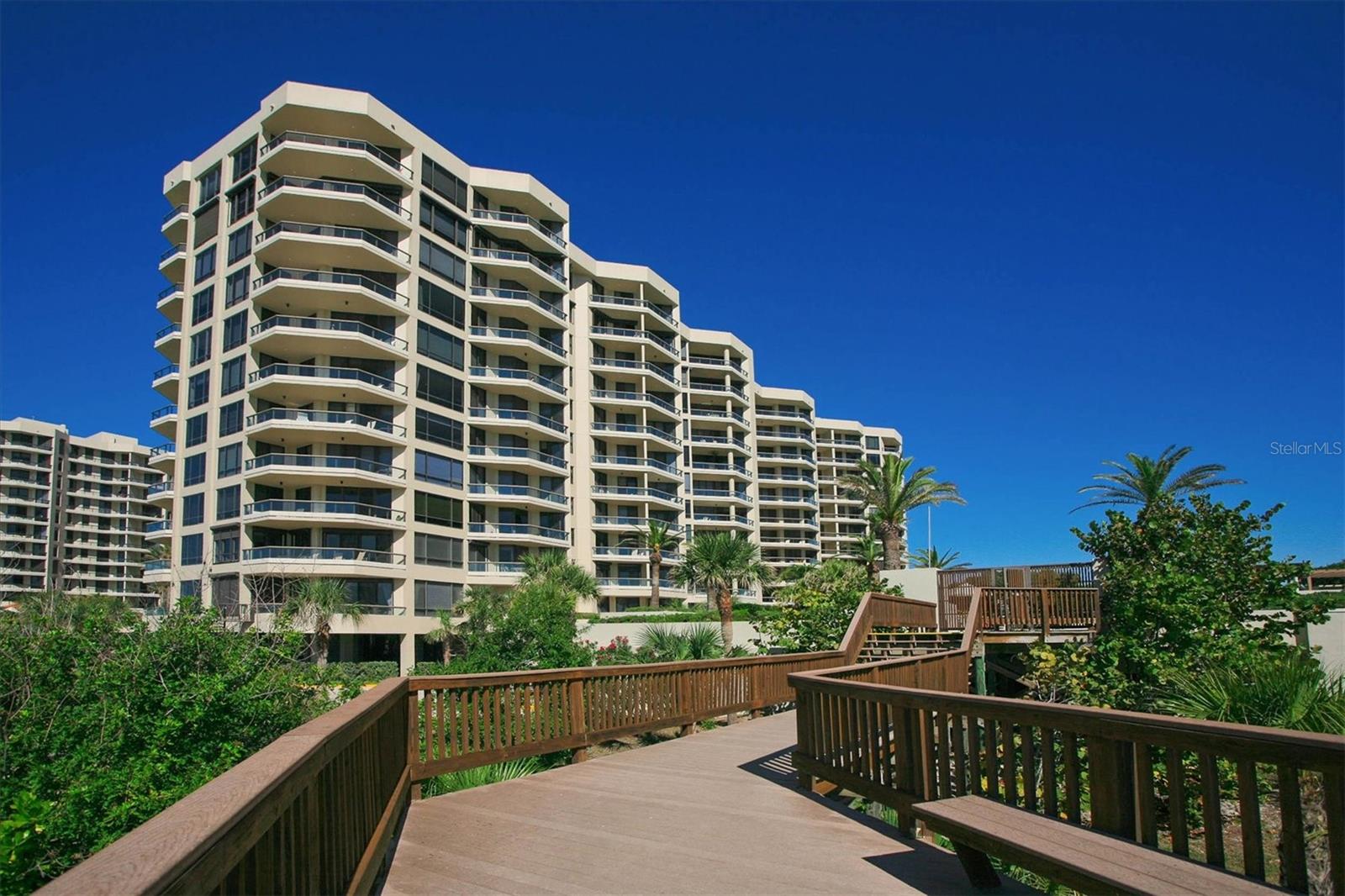 Gorgeous gulf front vacation rental! Be the first to lease this wonderfully renovated 10th-story penthouse condominium in the Promenade on Longboat Key. This elegant residence offers two bedrooms and two and one half baths in over 2,100 square feet of living space. Fabulous views of the Gulf from every window. No expense was spared during this renovation; you will love the open floor plan with a gourmet kitchen featuring quartz countertops, a breakfast bar, custom glass front cabinets, a glass front refrigerator and custom light fixtures. The flooring is luxury vinyl throughout, the main living area has a wet bar, electric fireplace, flat screen TV and lots of comfortable seating. The primary bedroom has a king bed, wall-mounted flat screen TV, built-in vanity and two walk-in closets, and the primary bath has a spacious shower with built-in seating and dual sinks. The guest bedroom and bath can be closed off for privacy and have a queen bed, wall-mounted flat screen TV and gorgeous water views! The Promenade is an upscale community with recently updated amenities, they have two areas to grill, a wonderful pool and spa, fitness, tennis and private beach access. The property is just five minutes to Publix, CVS and St Armands Circle.
